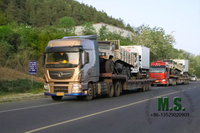//ilrorwxhonpplo5m-static.micyjz.com/cloud/lrBpiKoklrSRjlikpmojjq/Chinese-tractor-truck-carrying-the-truck-to-ship-out.jpg